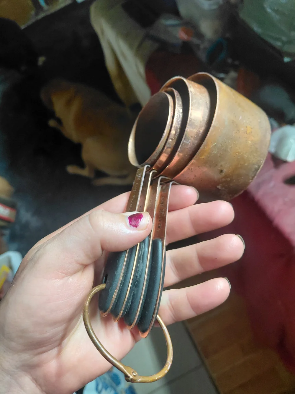 set of copper-plated stainless steel measuring cups